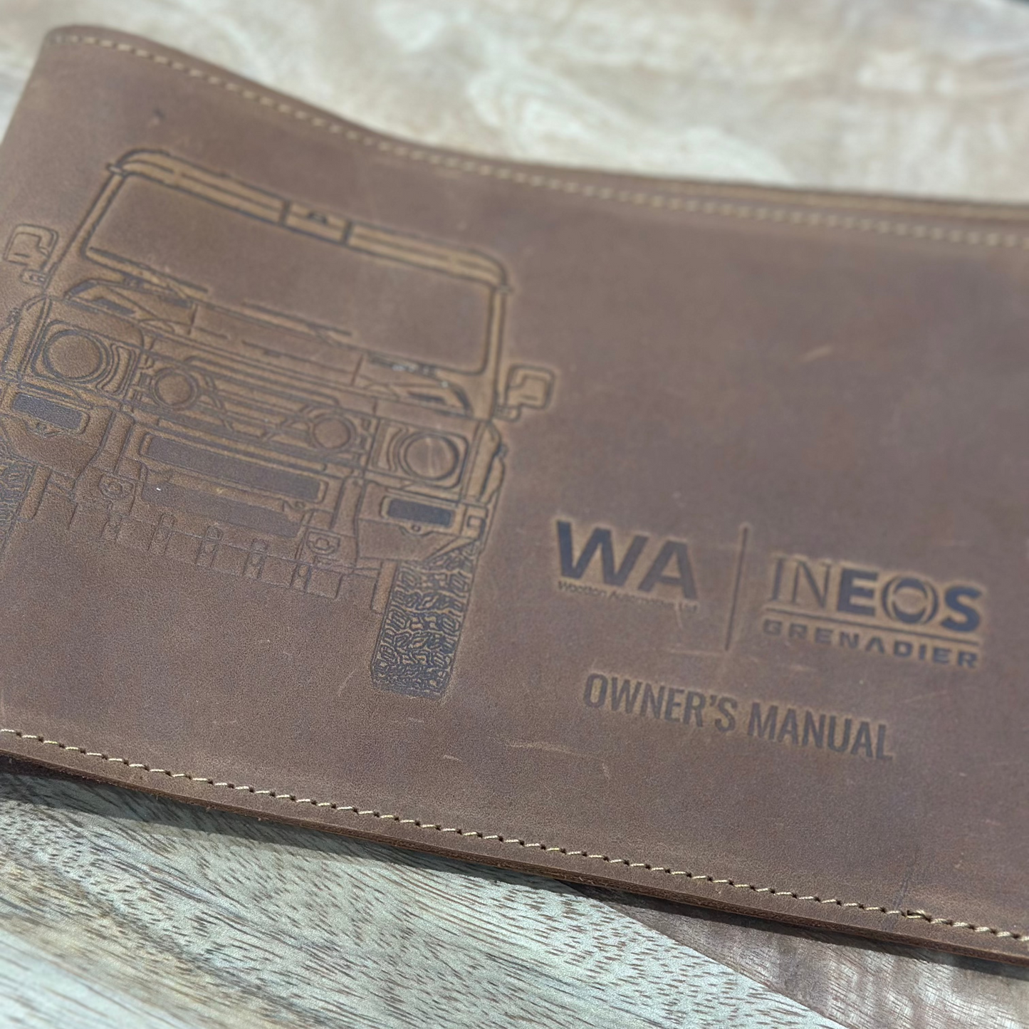WA | INEOS Grenadier Leather Owners Handbook Cover